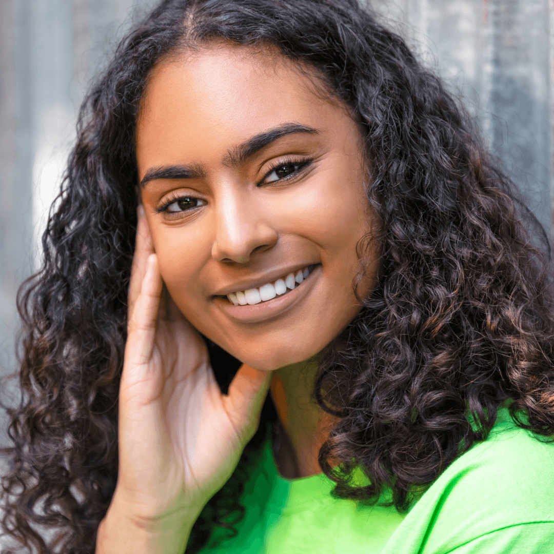 woman with short, curly, black hair