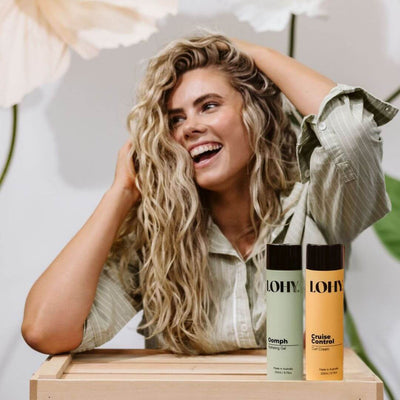 Blonde wavy curly hair girl with curl cream and curl hydration gel