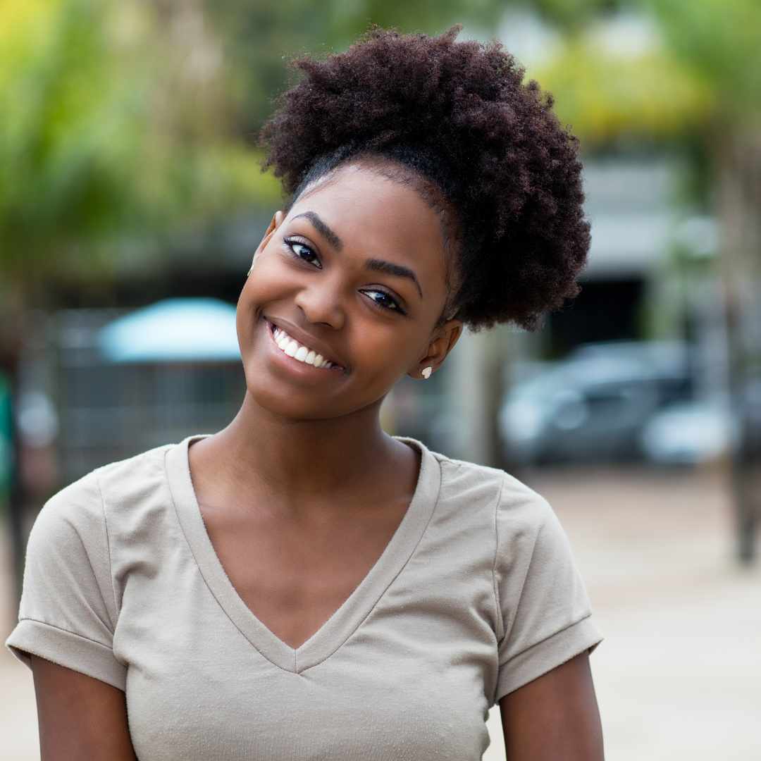 woman, frizzy black hair, high puff hairstyle