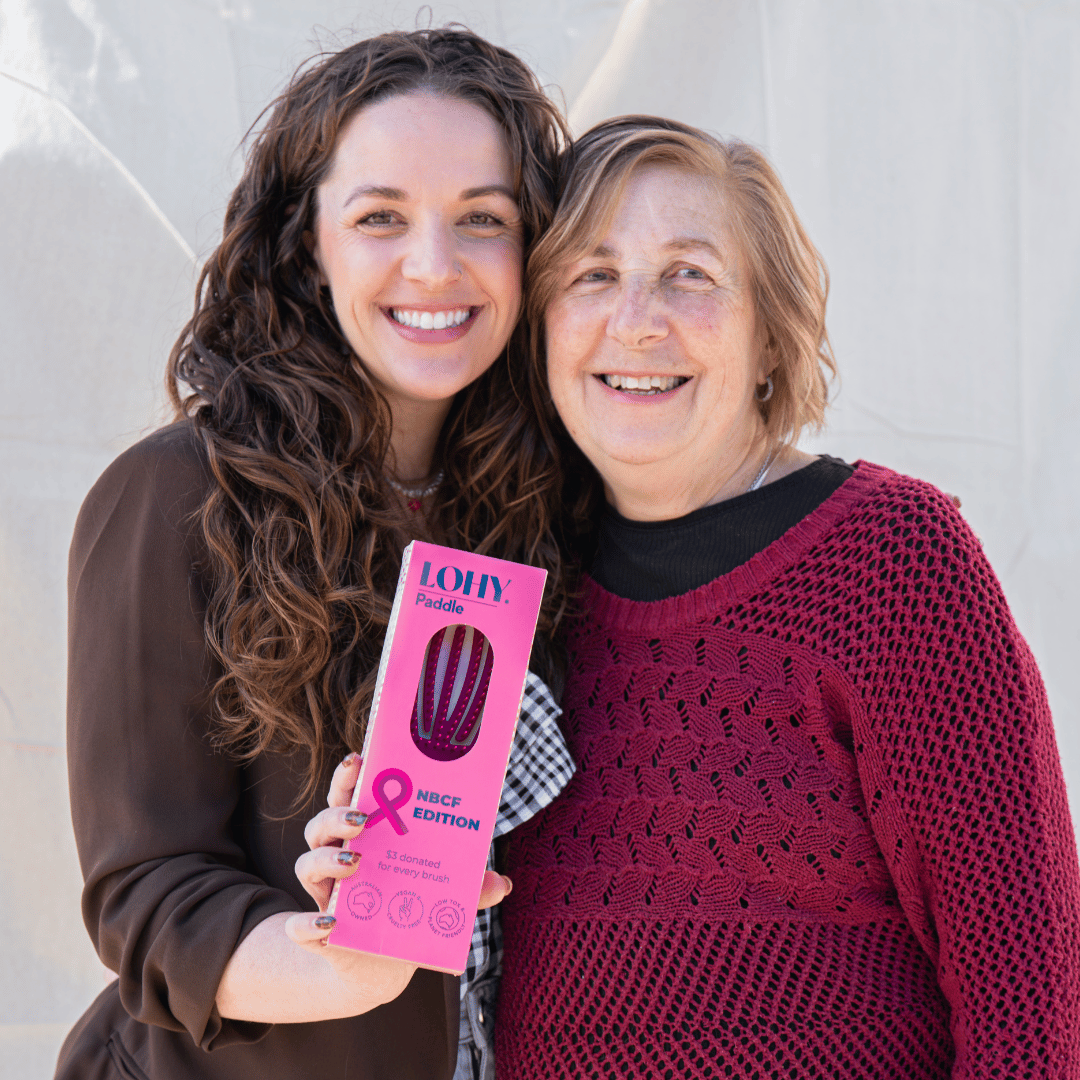 jonina and her mum smiling with LOHY. pink padde brush