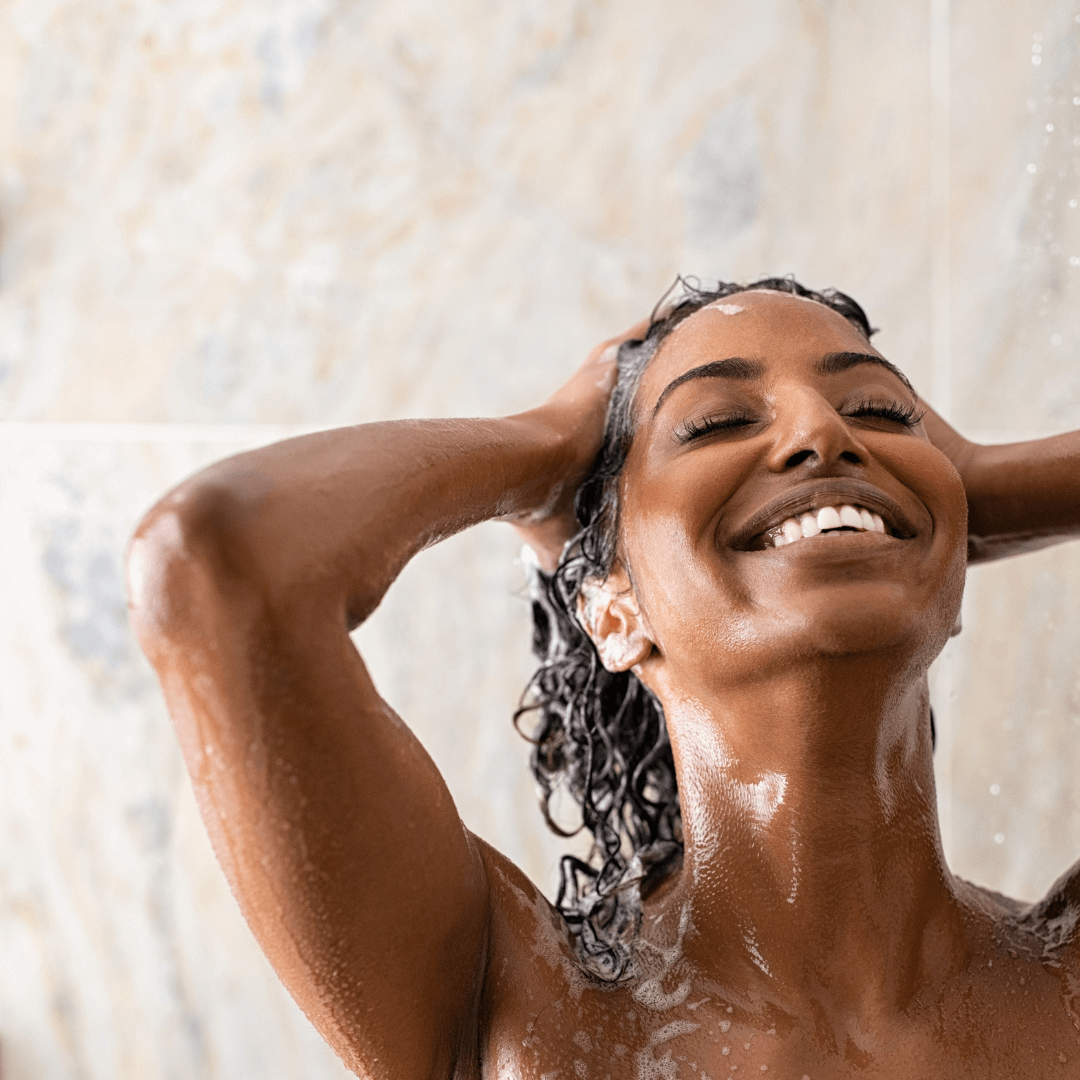 woman, showering, curly black hair