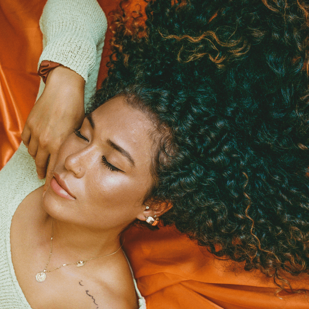 woman, long curly black hair